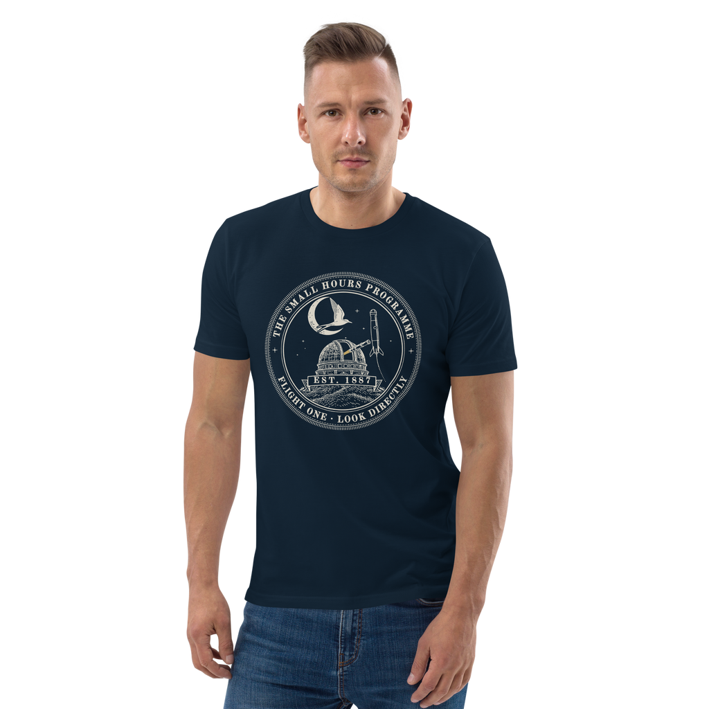 Model wearing the Small Hours Programme, Flight One tee in French Navy, the round stitched patch at centre chest