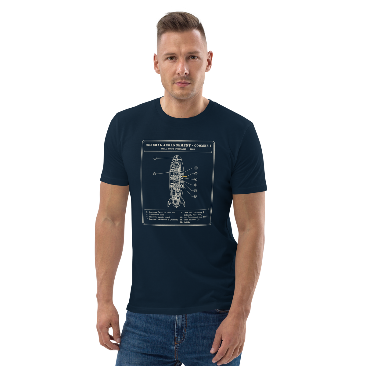 Model wearing the General Arrangement, Coombe I tee in French Navy, the rocket cutaway and typed key at centre chest