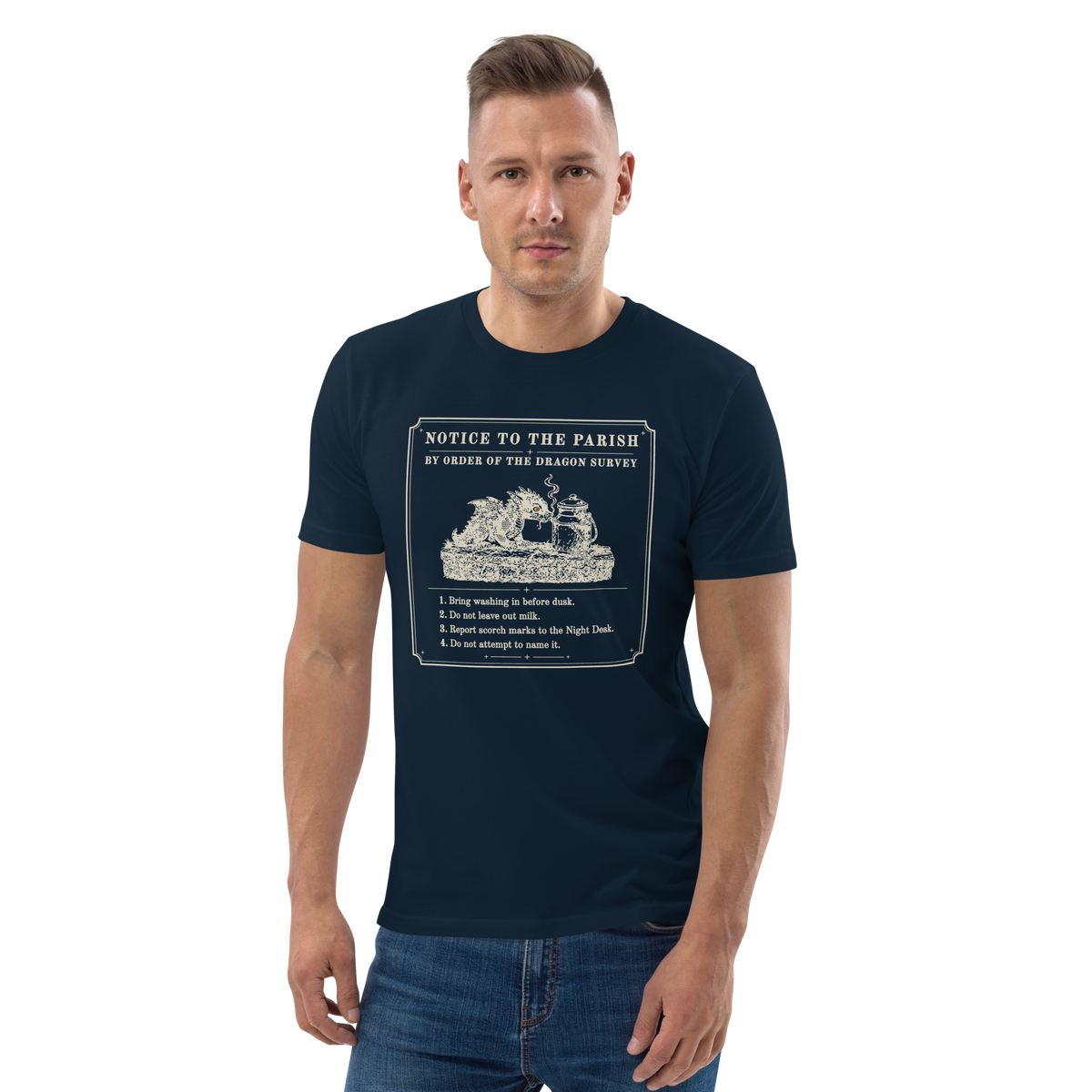 Model wearing the Notice to the Parish tee in French Navy, woodcut dragon notice with four numbered rules at centre chest