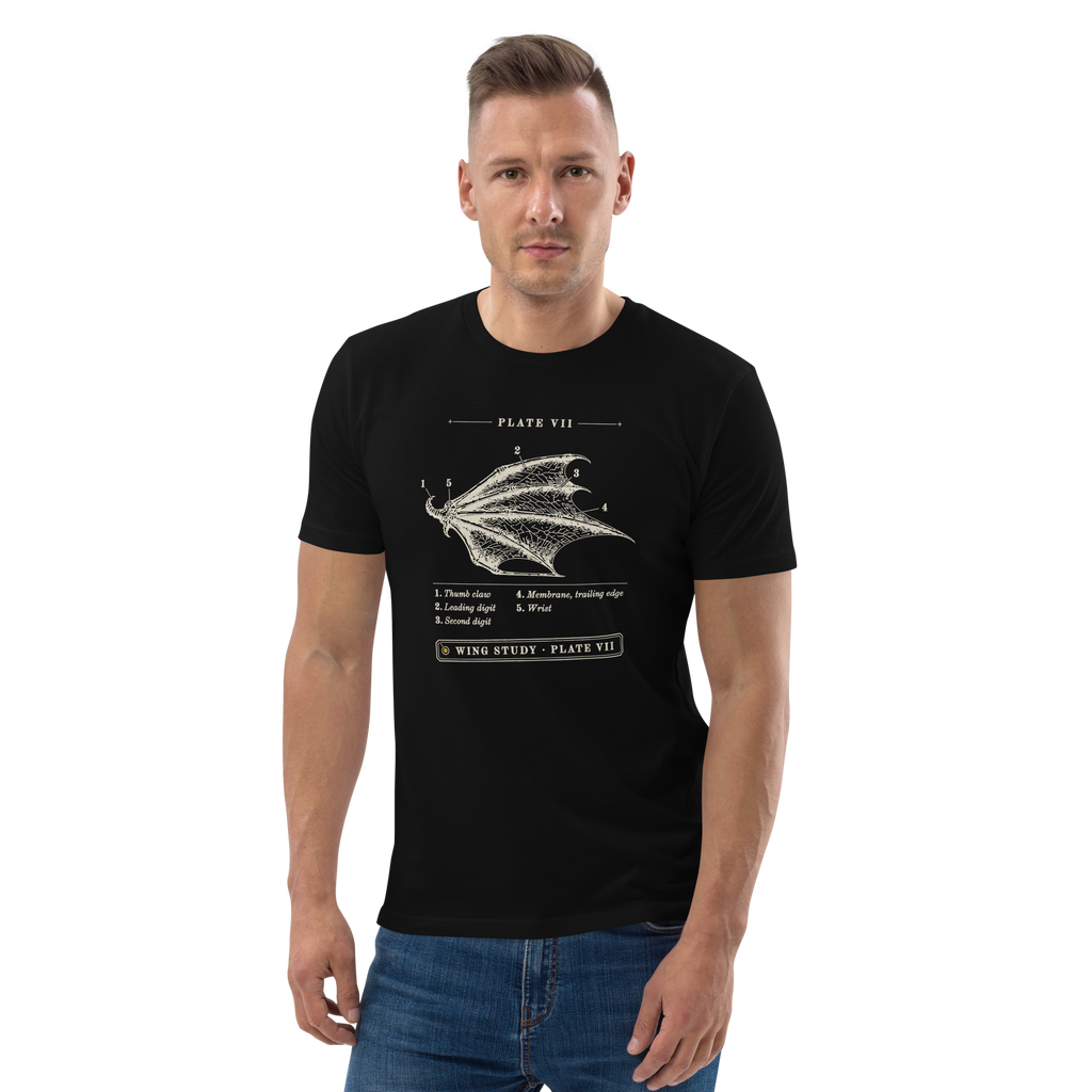 Model wearing the Wing Study, Plate VII tee in Black, engraved dragon wing with five numbered callouts at centre chest