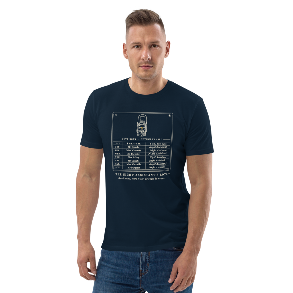Model wearing The Night Assistant's Rota tee in French Navy, the rota and gold lantern at centre chest