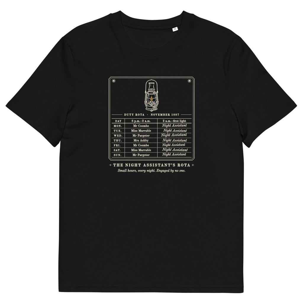 The Night Assistant's Rota t-shirt in Black: duty rota under a gold-flamed lantern, one name on every late shift
