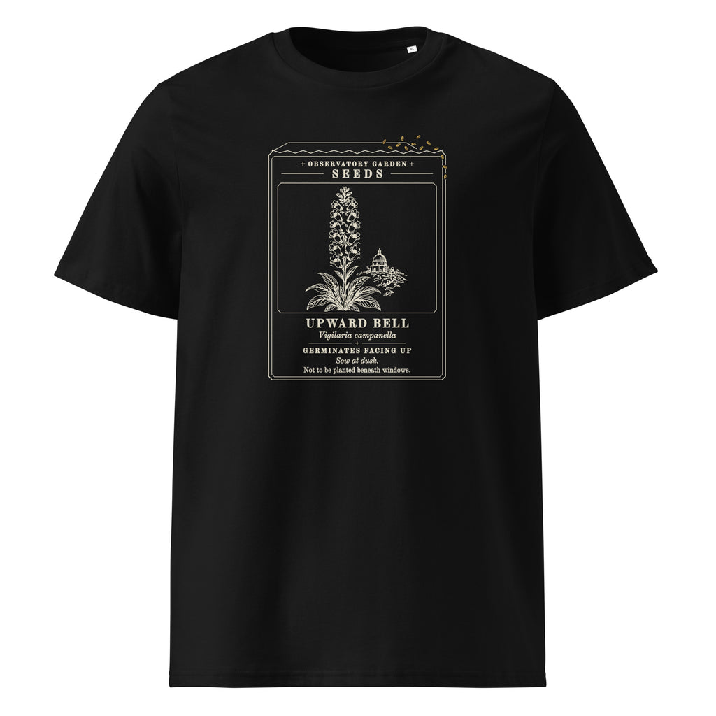 Germinates Facing Up t-shirt in Black: seed packet, a plant with upturned bells, a dome behind, gold seeds spilling