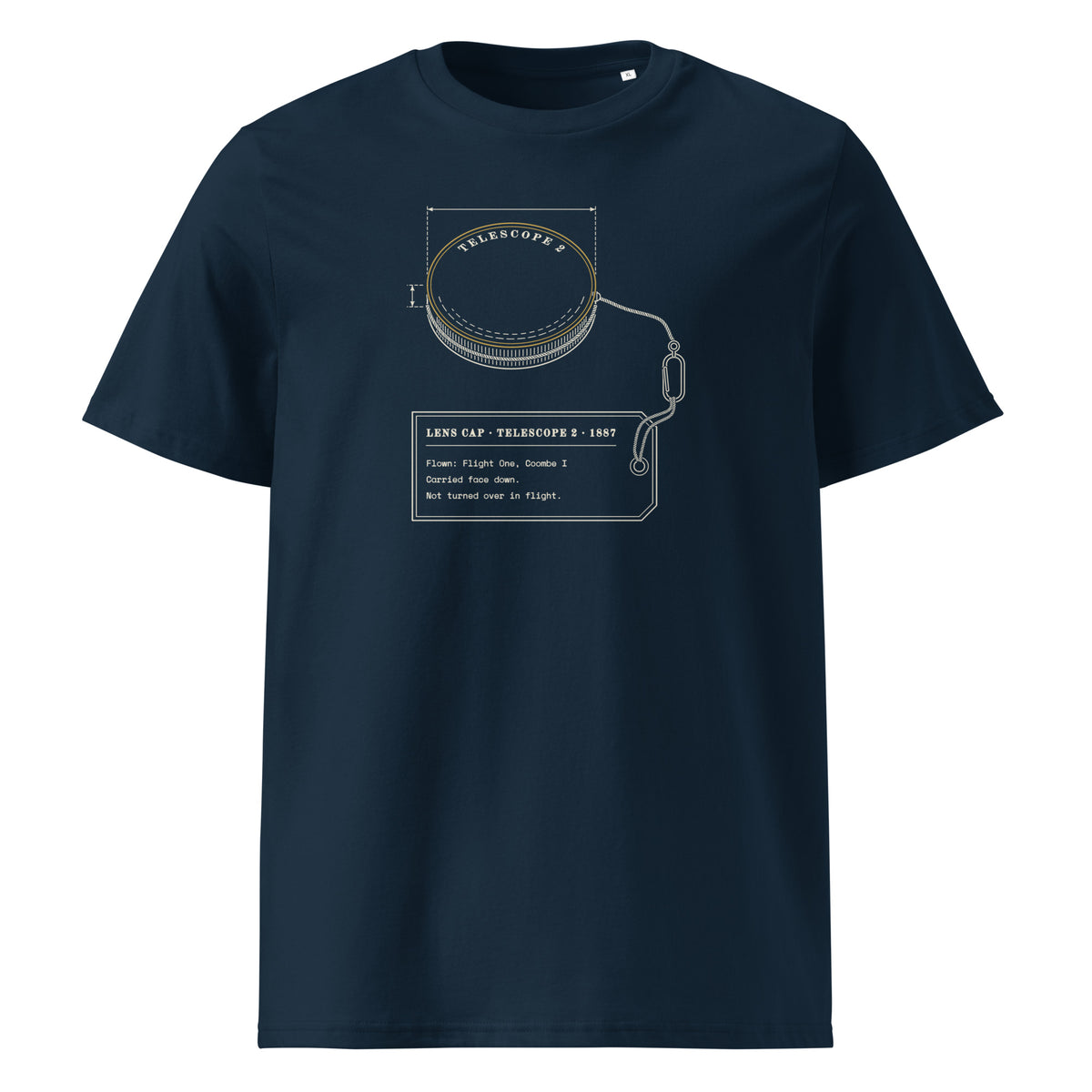 Lens Cap, Flown t-shirt in French Navy: brass telescope lens cap seen from outside, gold rim, tethered to a flight tag